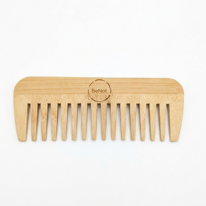 White natural bamboo hair comb for detangling, featuring smooth teeth and eco-friendly bamboo material.