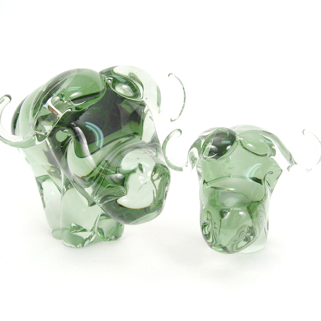 Detailed handblown recycled-glass buffalo, eco-friendly African decor.