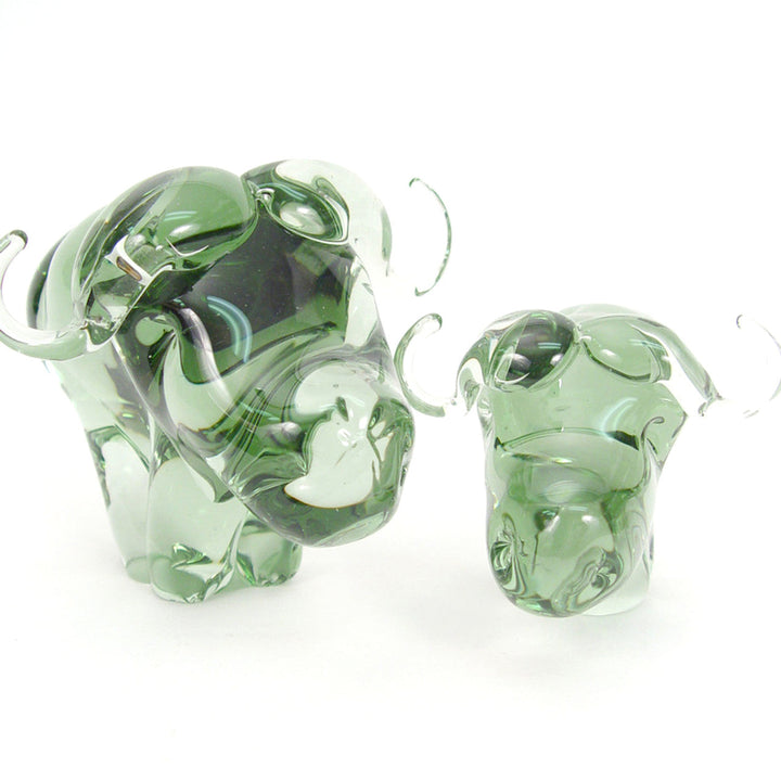 Detailed handblown recycled-glass buffalo, eco-friendly African decor.