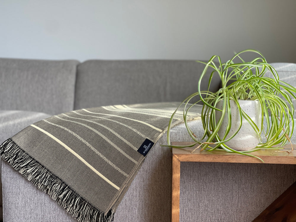 Cedar Brown Andean throw blanket showing the striped weave and 2-inch fringe.