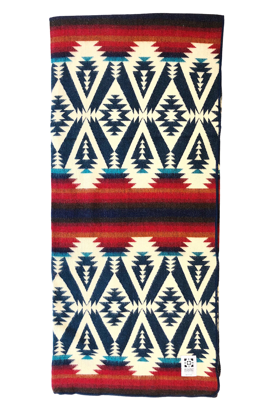 Handwoven Andean throw blanket in navy and teal with red and rust striped bands on cream.