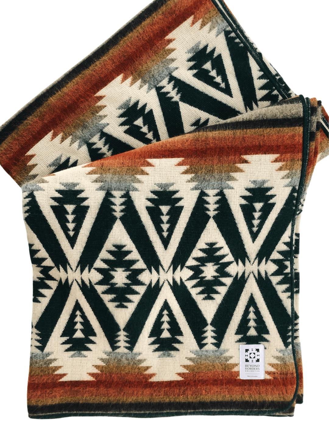Handwoven Andean throw blanket in evergreen green with rust, mustard, and grey on cream.