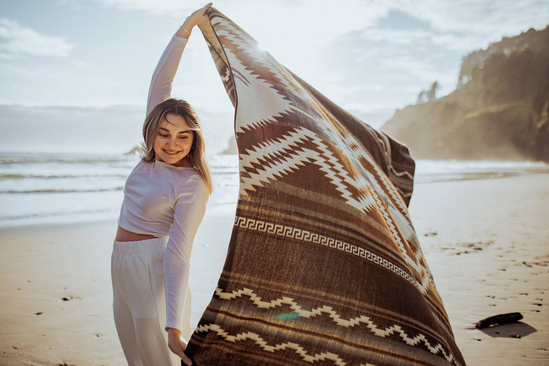 Brown and cream Shuar throw blanket with a reversible Andean geometric weave.
