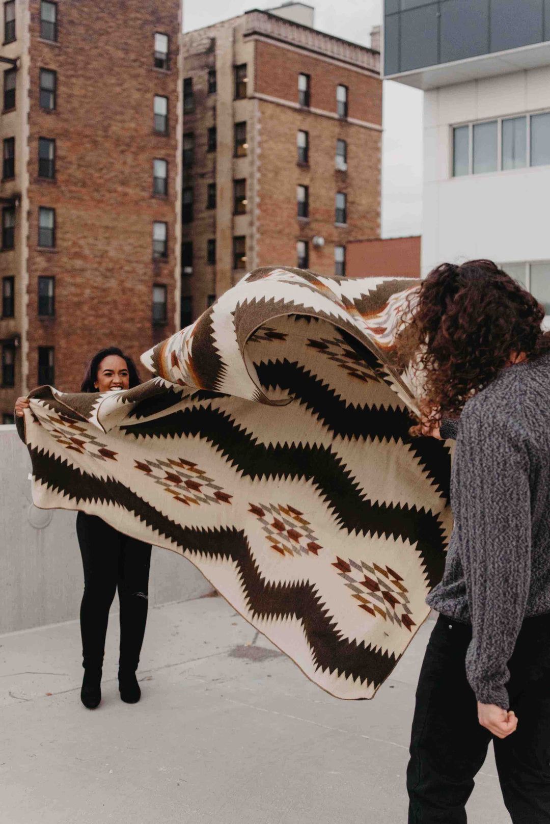 Beyond Borders Collective Tsachila Chocolate blanket, Andean geometric in warm chocolate and cream.