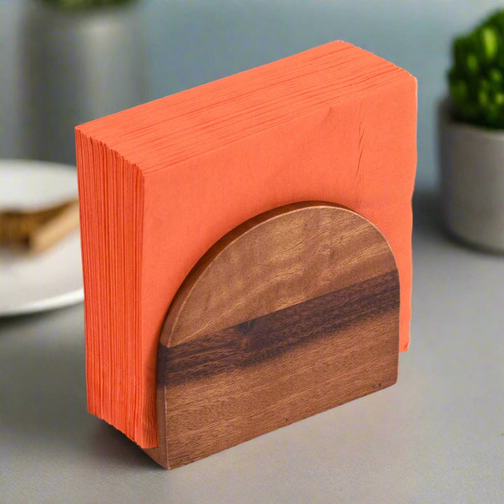 Acacia wood vertical napkin holder with a sleek, natural finish.