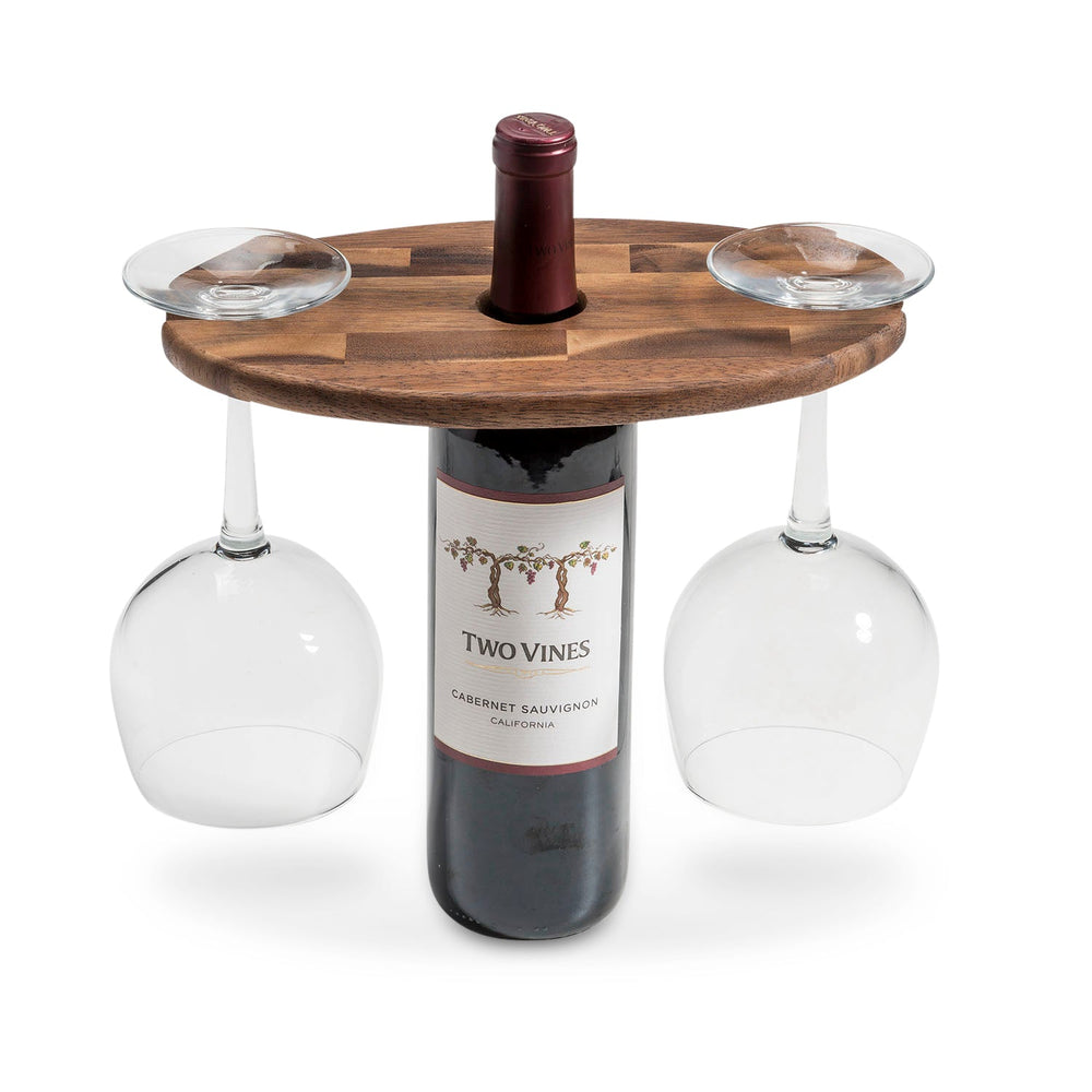 End-grain acacia wood wine glass caddy holding two glasses on a bottle.