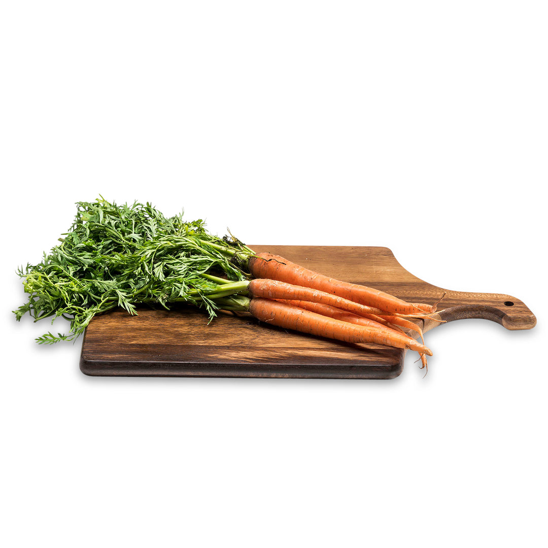 Large acacia wood charcuterie board, ideal for serving cheese and appetizers.