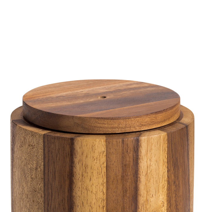 Acacia wood rotating lazy Susan utensil holder with several compartments.