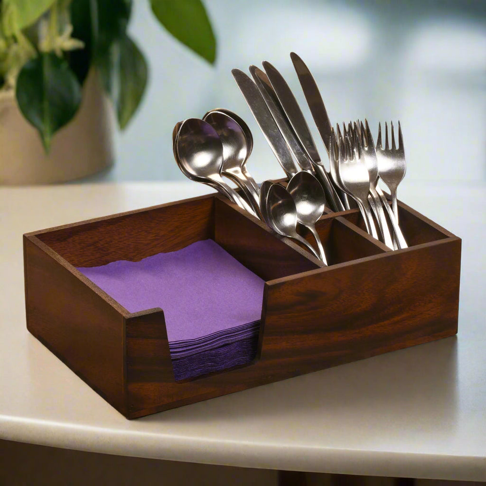 Acacia wood flatware and napkin caddy with two compartments.