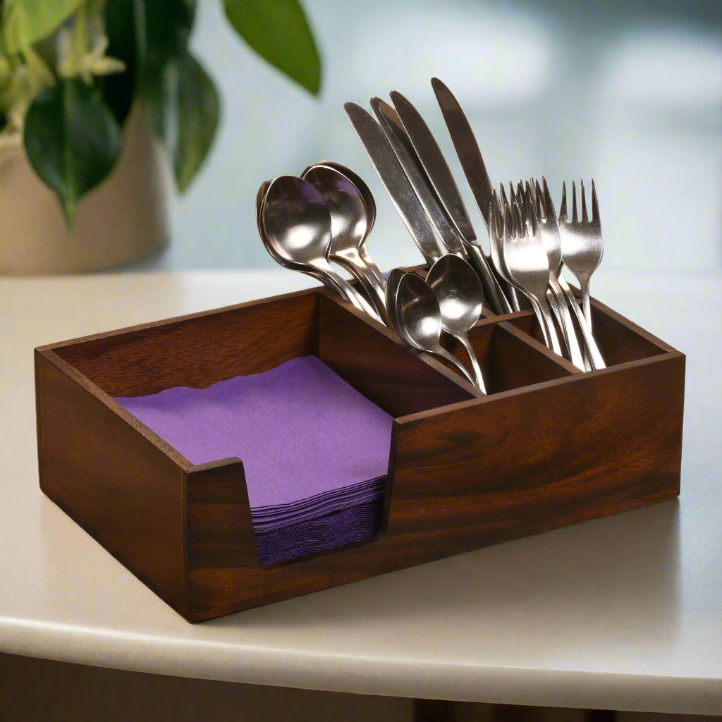 Acacia wood flatware and napkin caddy with two compartments.