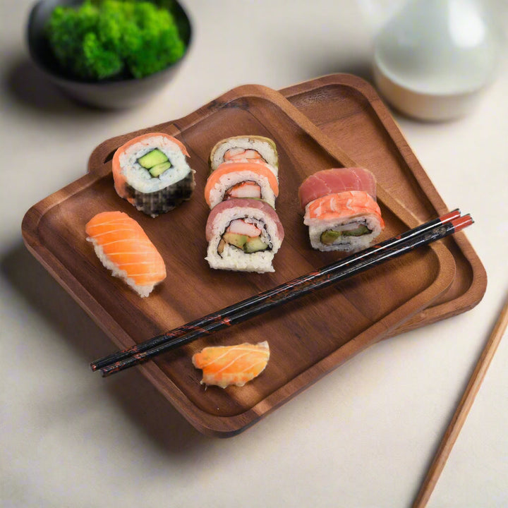 Two acacia wood square plates with natural wood grain and a modern design.