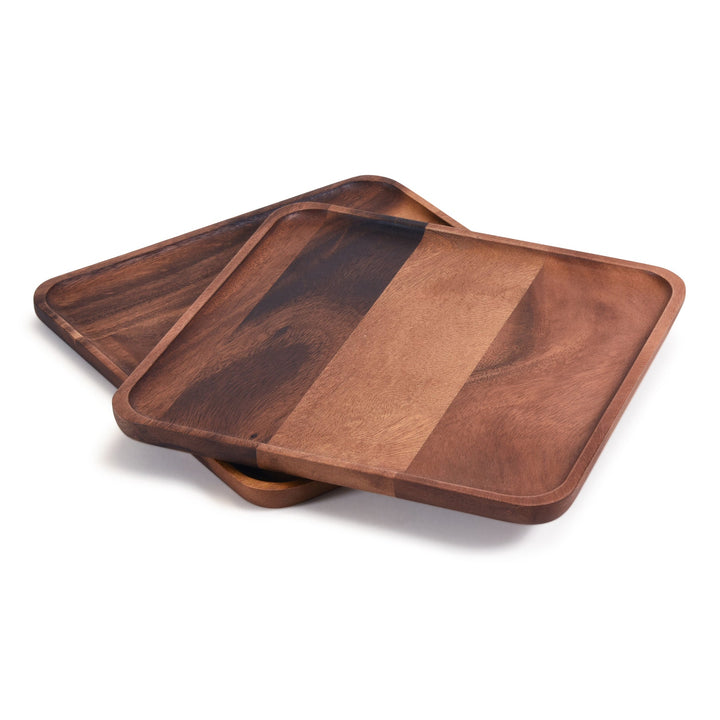 Two acacia wood square plates with natural grain in a rustic serving style.