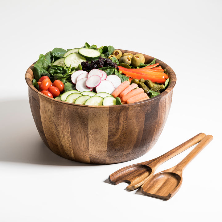 Extra-large Soro acacia wood salad bowl with matching servers for fresh salads.