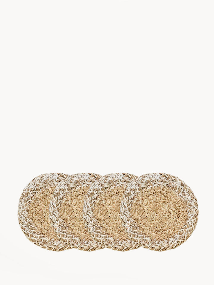 Set of 4 jute drink coasters with distinctive cream openwork outer ring on tan jute center