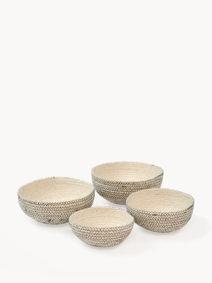 Set of 4 nesting jute bowls in off-white with black zigzag stitching
