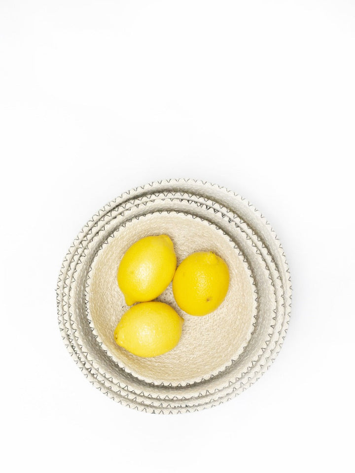 Four nesting jute bowls in cream with black contrast stitching, Fair Trade made