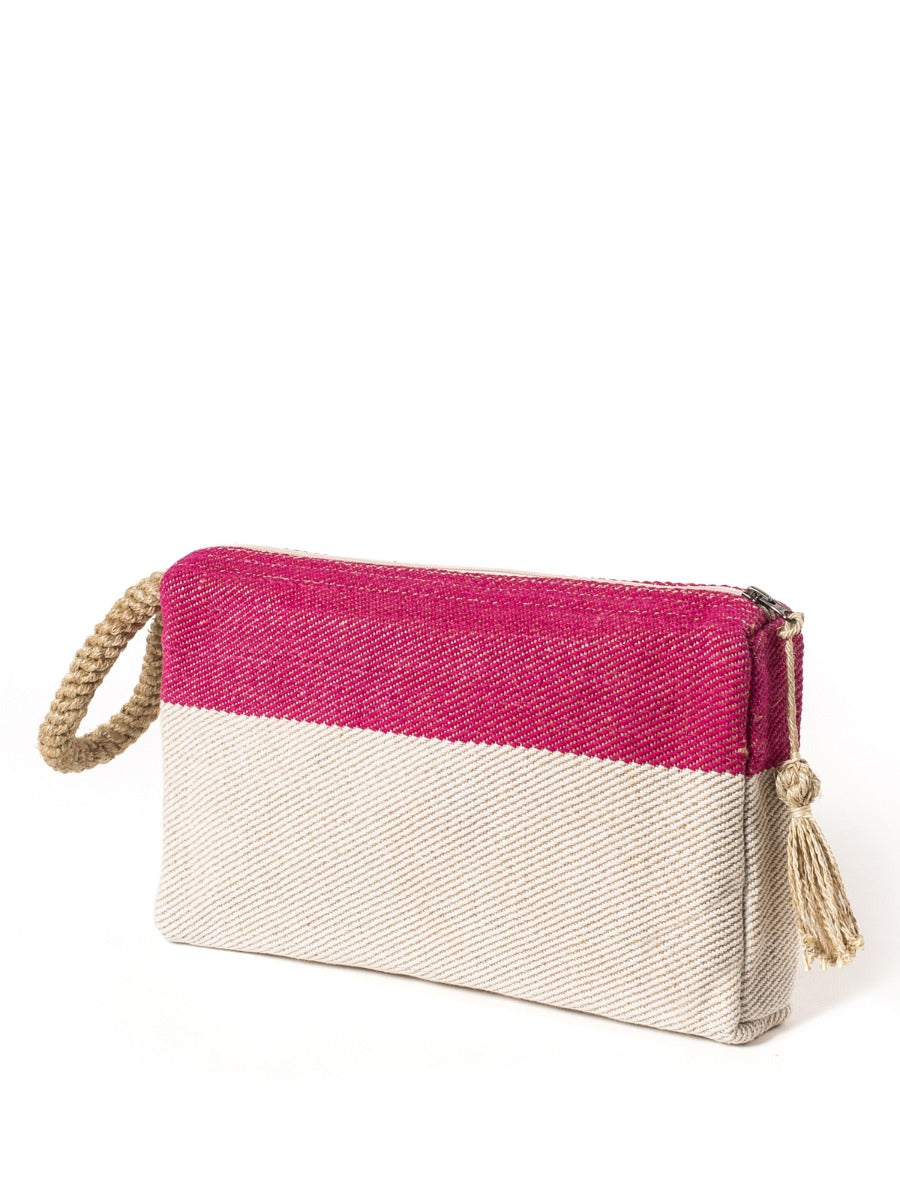 Handwoven jute-cotton clutch bag in pink with color-block design and macrame accent handle