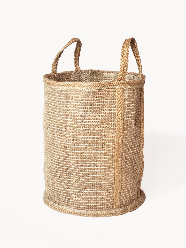 Tall natural braided jute laundry hamper with handles, handwoven storage