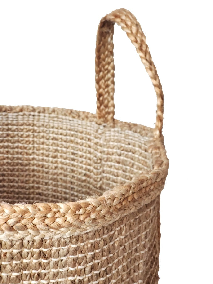 Natural braided jute hamper by DC-KORISSA with sturdy handles, ideal for laundry or storage.