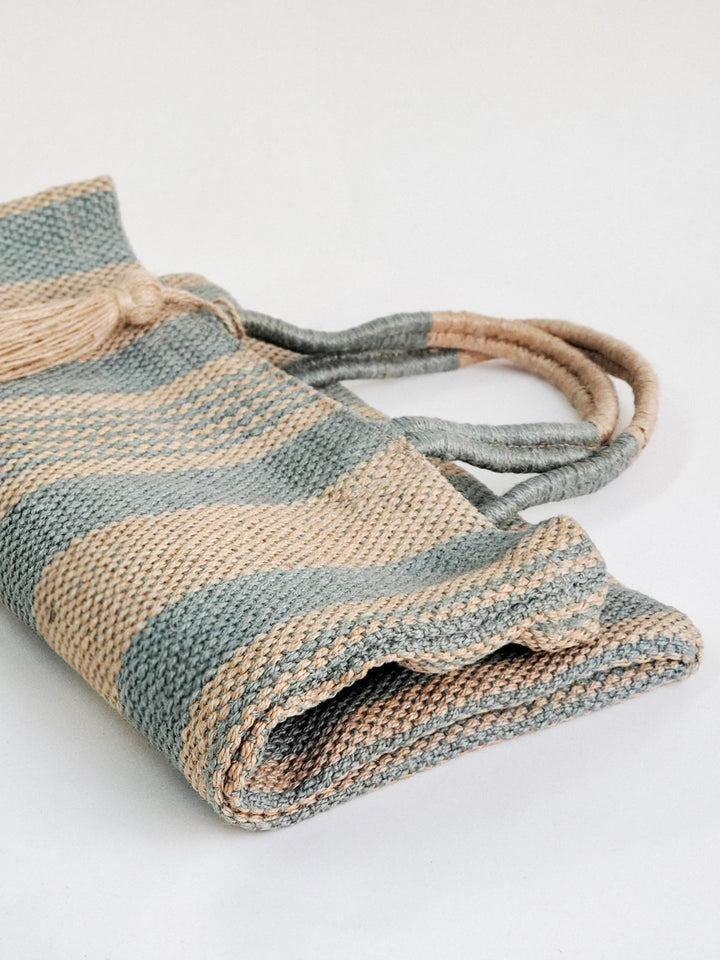 Coastal pale-green striped jute tote with sturdy wrapped handles