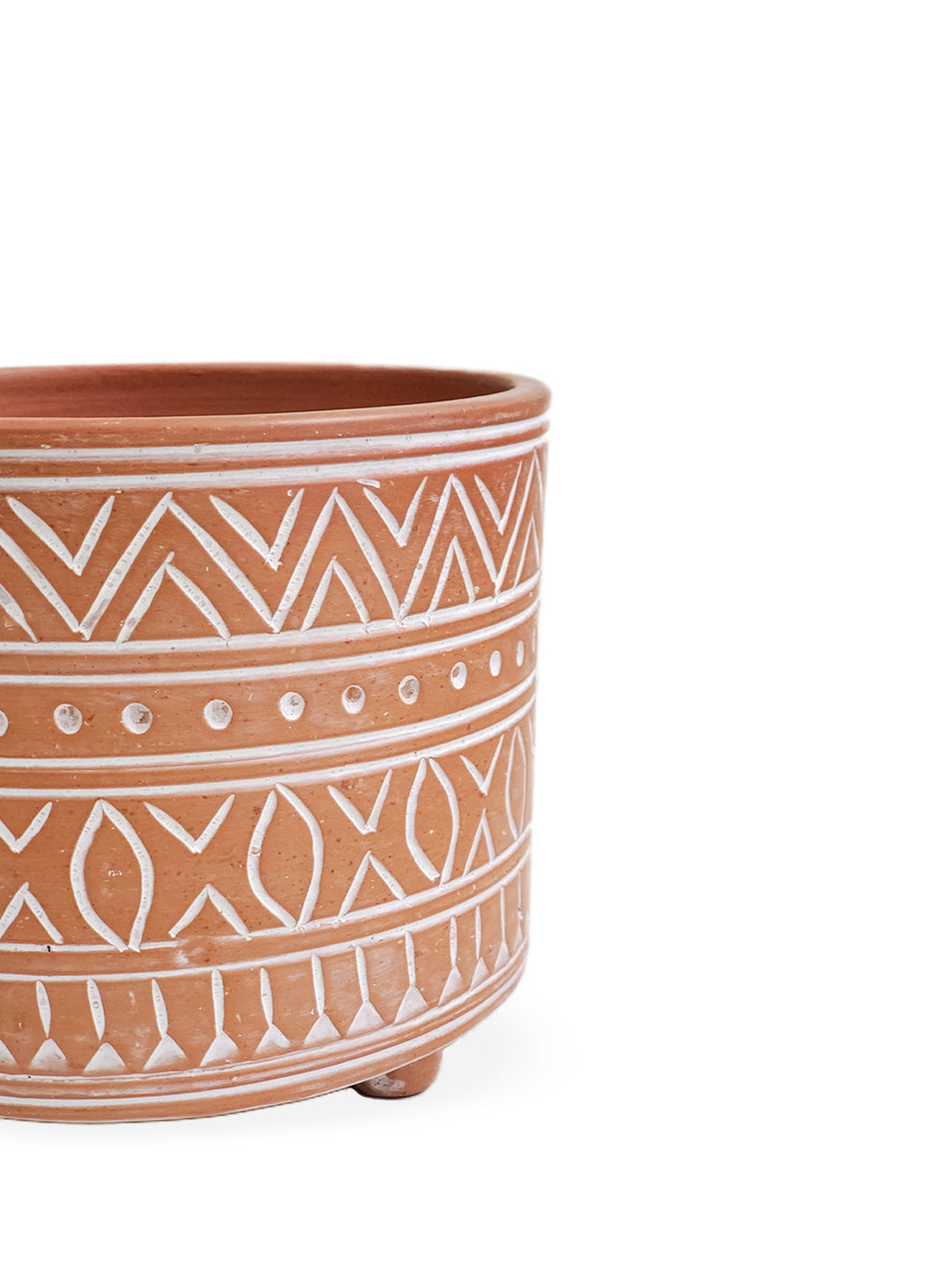 Small hand-etched terracotta pot with an earthy natural finish