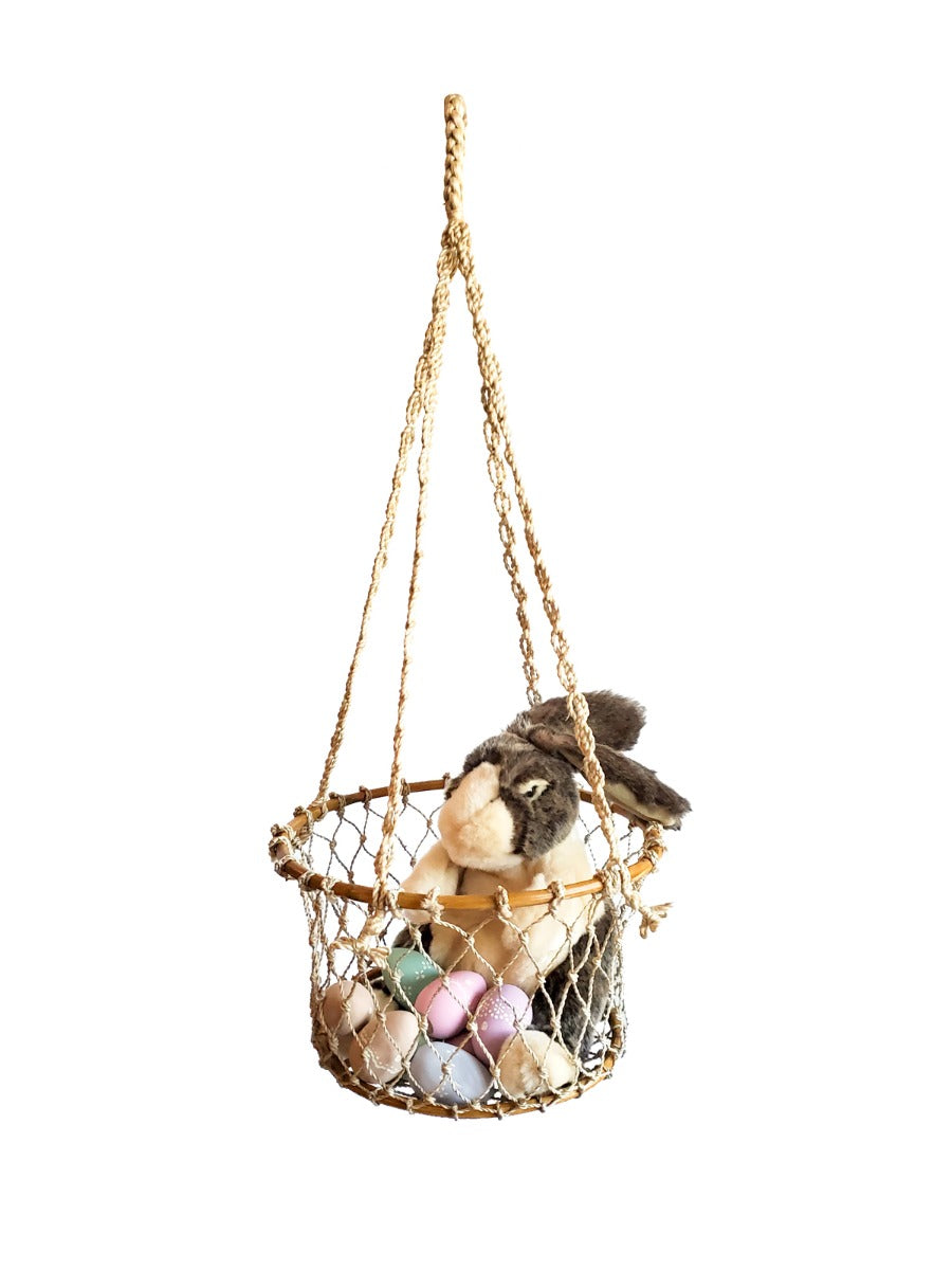 Handwoven jute hanging basket with a natural finish