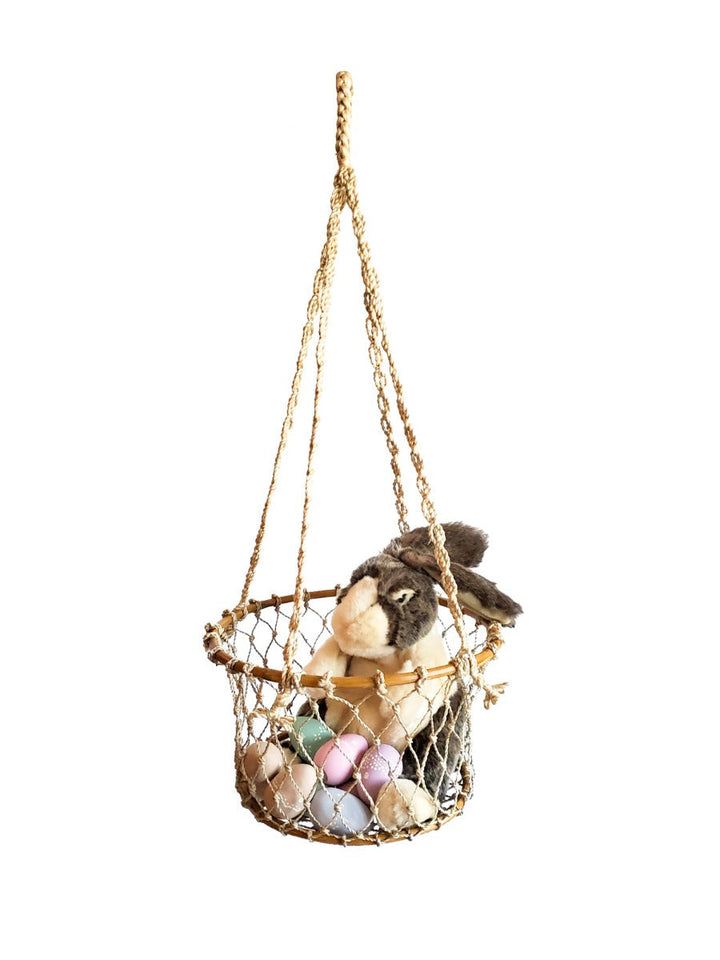 Handwoven jute hanging basket with a natural finish