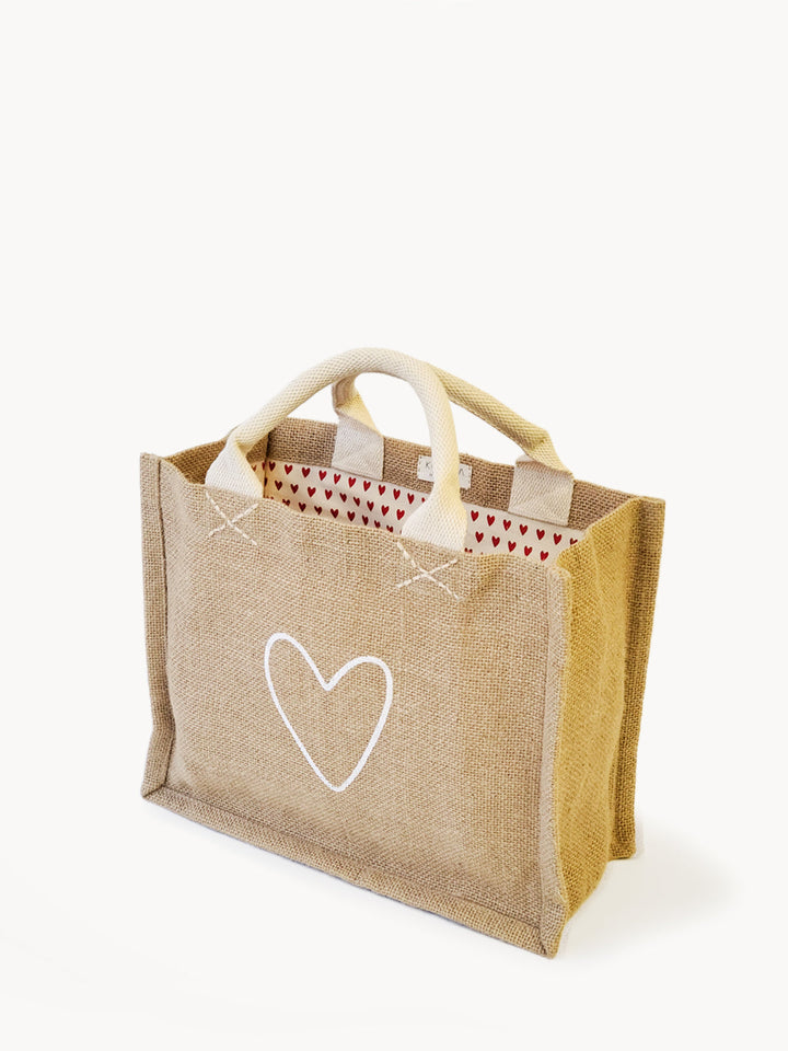Jute canvas gift bag with a heart Love print and natural burlap texture