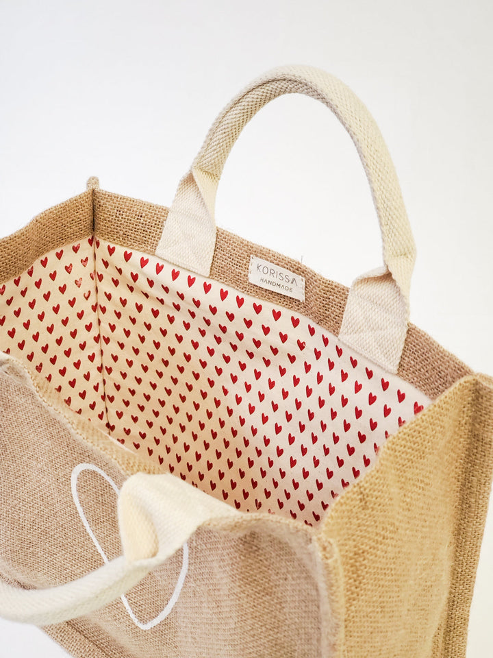 Jute canvas gift bag with a Love print and sturdy handles for gifting