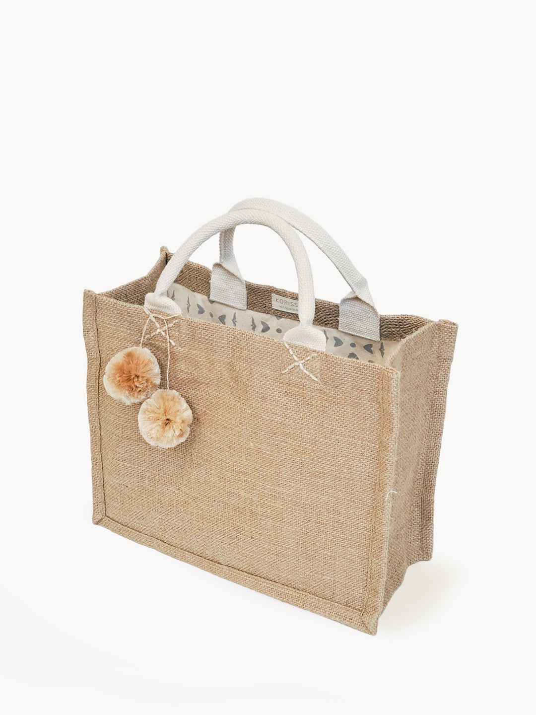 Jute canvas gift bag with colorful pompom accents and natural burlap