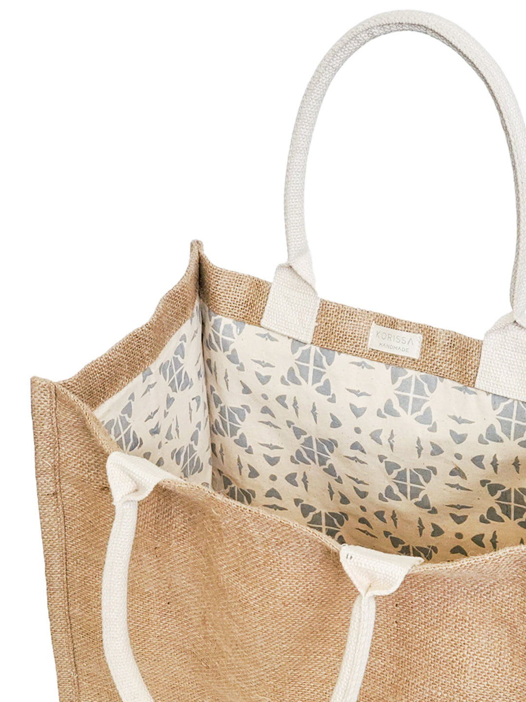Eco-friendly jute canvas market bag with a pompom detail