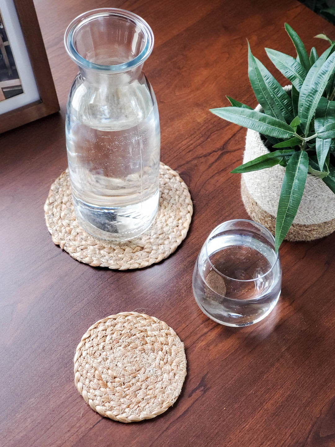 Handwoven jute coasters with concentric braided rings, sized for cups and glasses