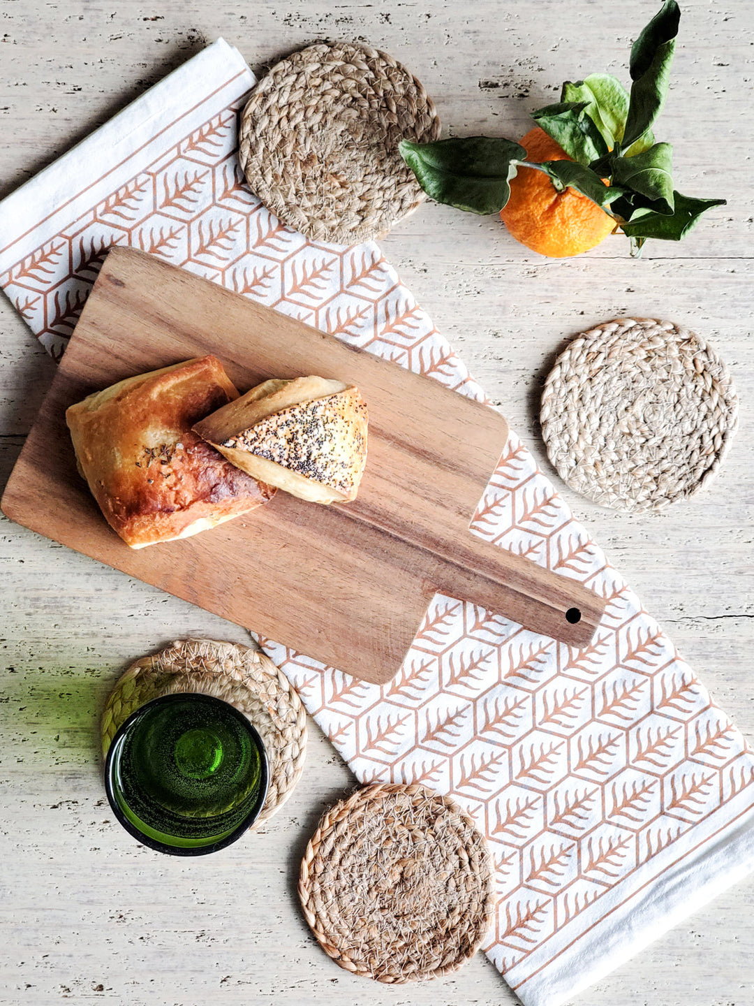 Pure jute drink coasters in monochrome tan, handwoven by Fair Trade artisans