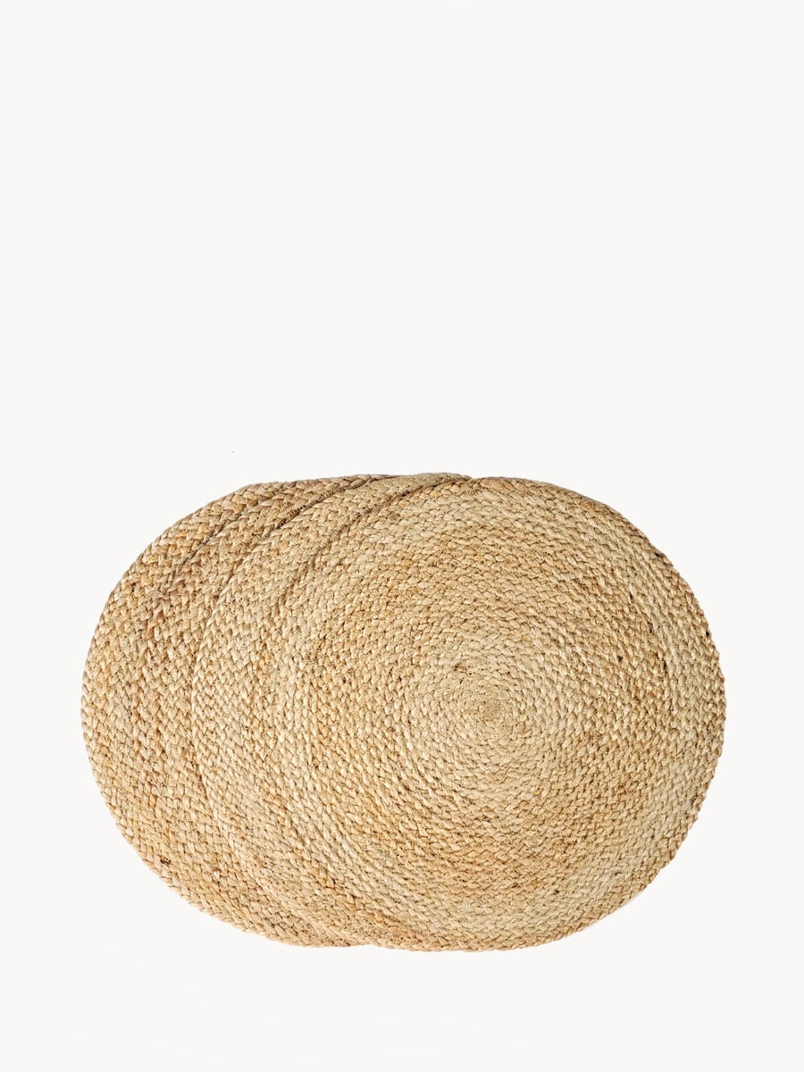 Set of four natural jute round placemats, handwoven for the dining table