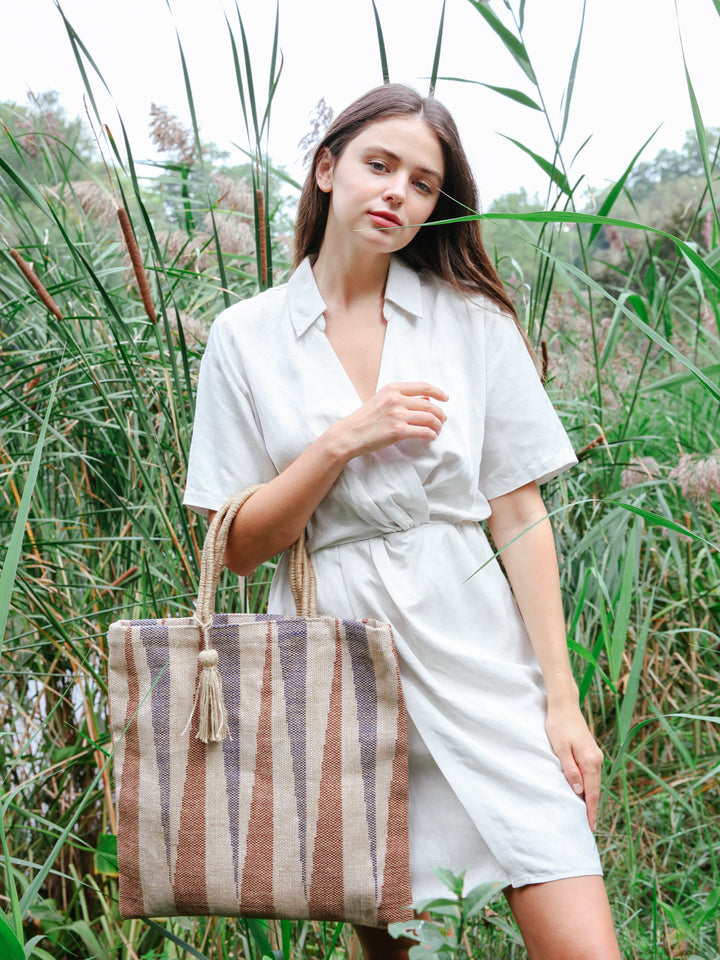 Multi-color striped jute tote bag, handwoven by artisans in Bangladesh