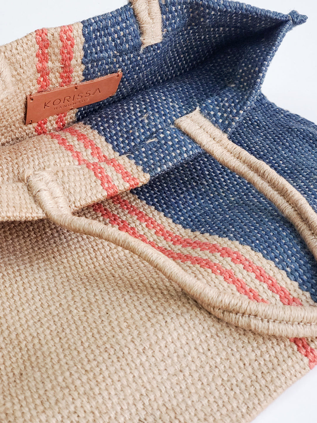 Handwoven jute carry tote in navy color-block with red stripes, Fair Trade made