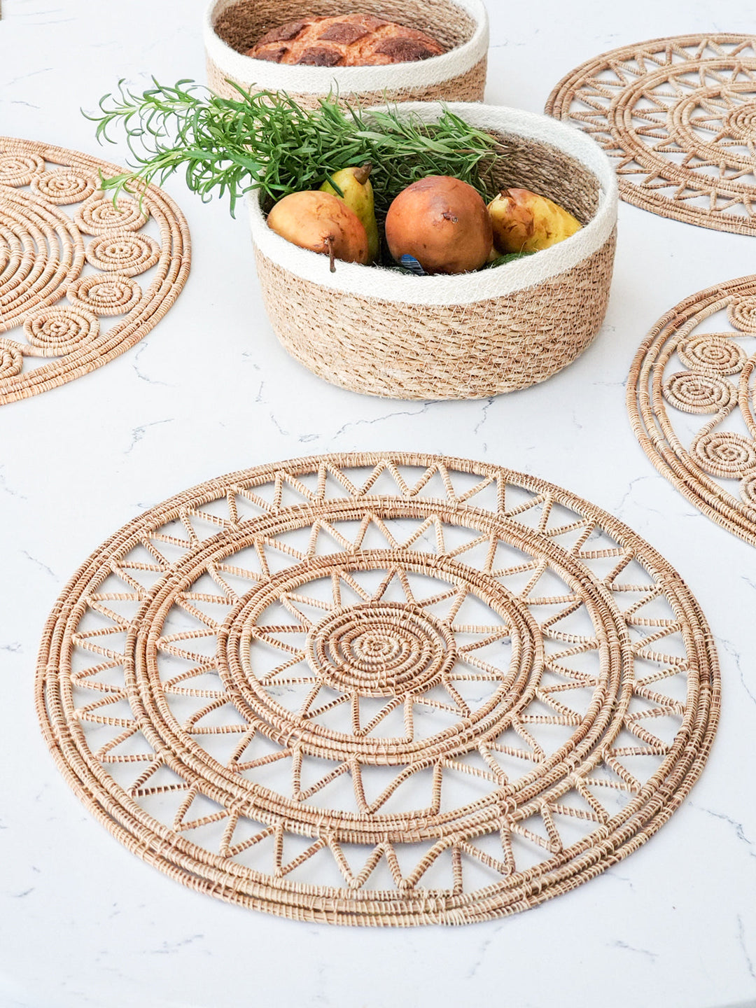 Open-weave natural palm fiber placemats with sunburst pattern, handwoven, set of 2