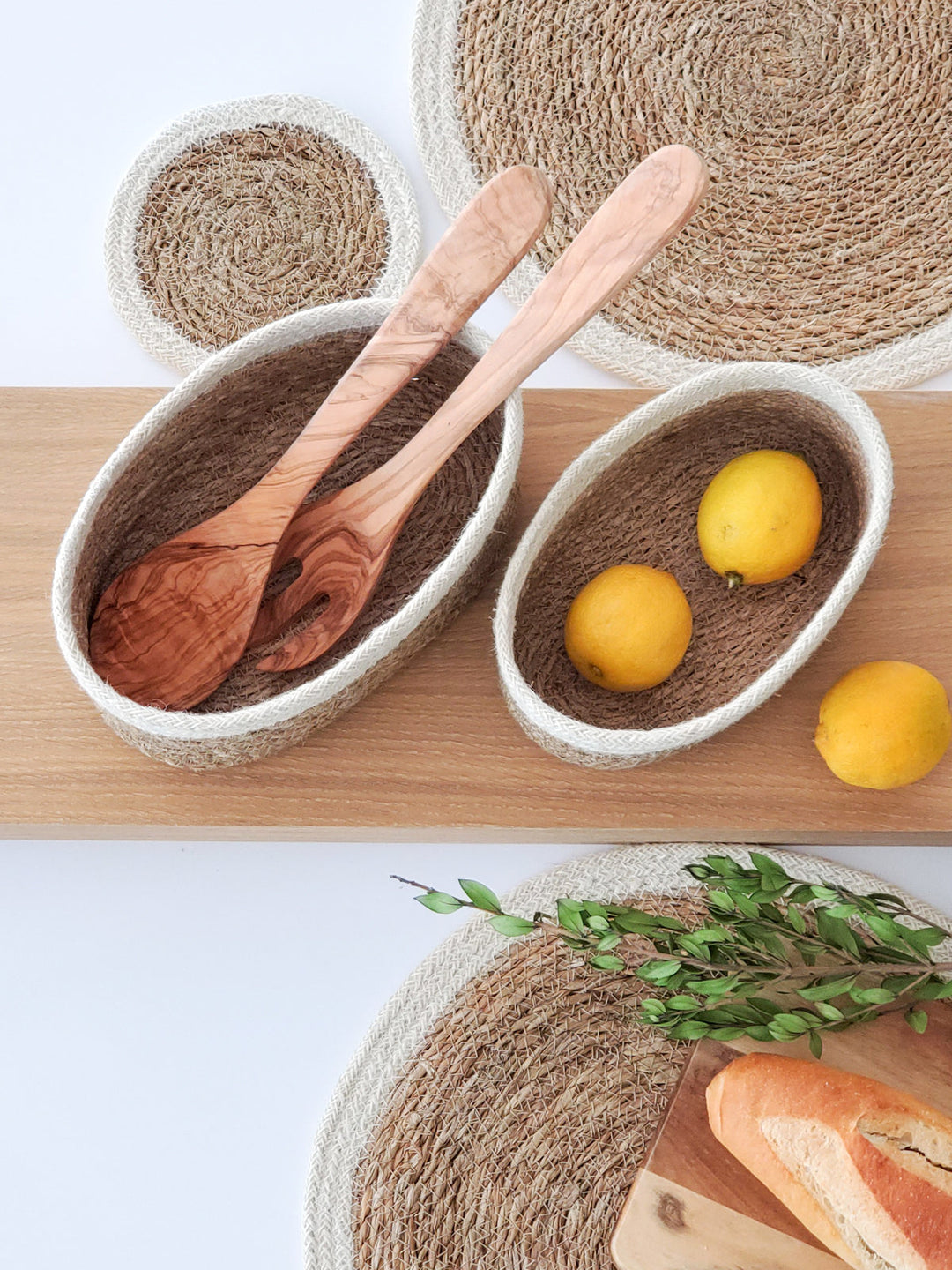 Set of three oval seagrass storage baskets by DC-KORISSA, natural woven baskets for organizing and decor.