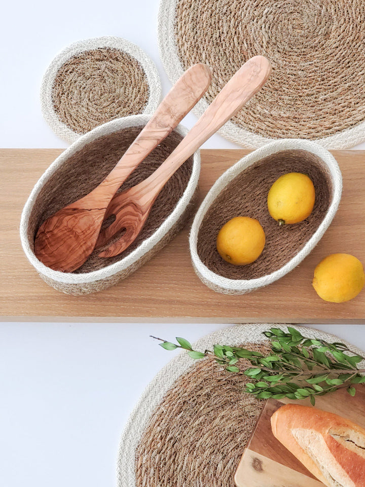 Set of three oval seagrass storage baskets by DC-KORISSA, natural woven baskets for organizing and decor.
