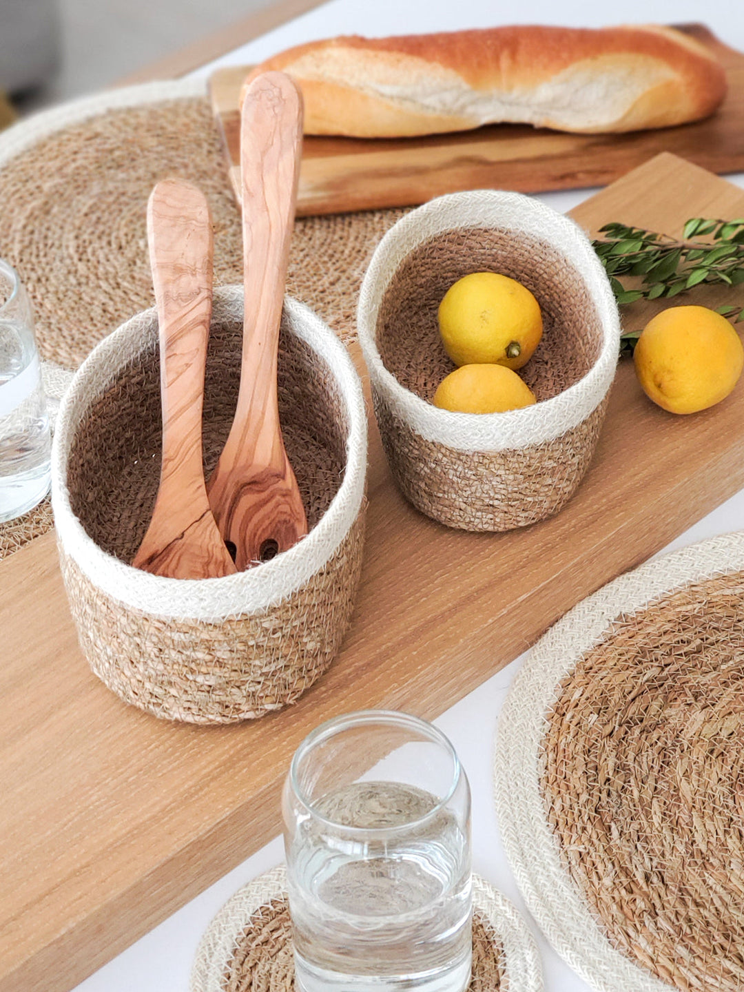 Set of three DC-KORISSA oval seagrass storage baskets, natural woven design for organization and decorative use.