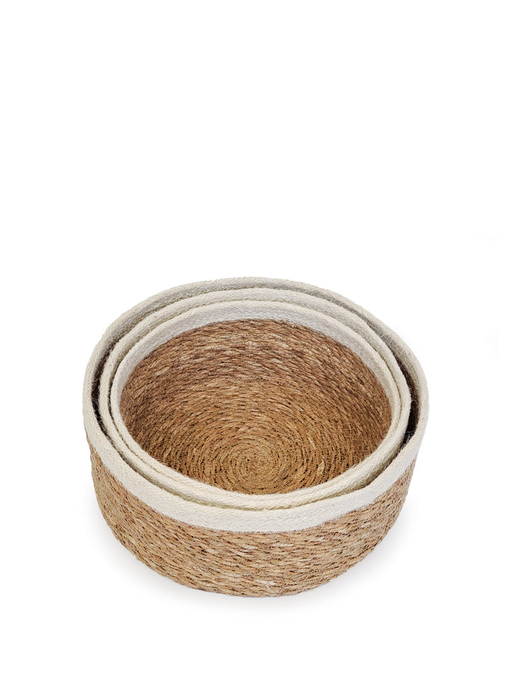 Set of three natural storage bowls by DC-KORISSA, woven baskets perfect for organizing kitchen or home essentials.