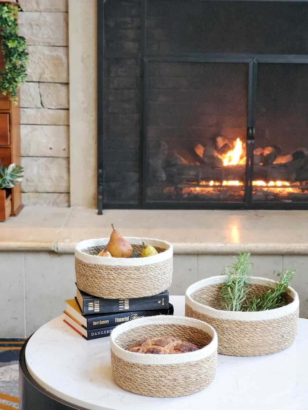 Set of three natural storage bowls by DC-KORISSA, woven baskets ideal for organizing kitchen or home essentials.