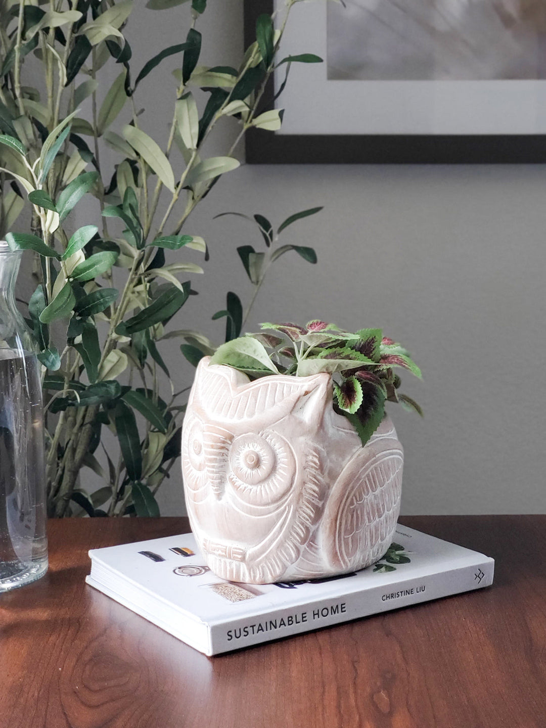 Terracotta owl planter with a detailed horned-owl design