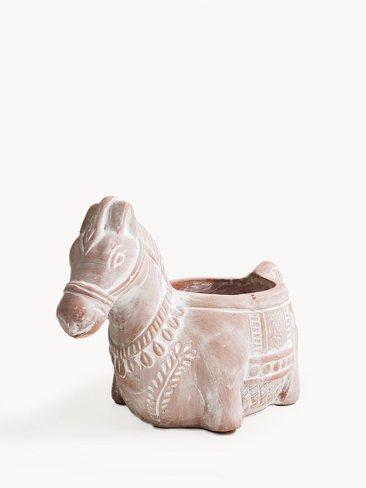 Terracotta horse planter with a detailed design and earthy finish