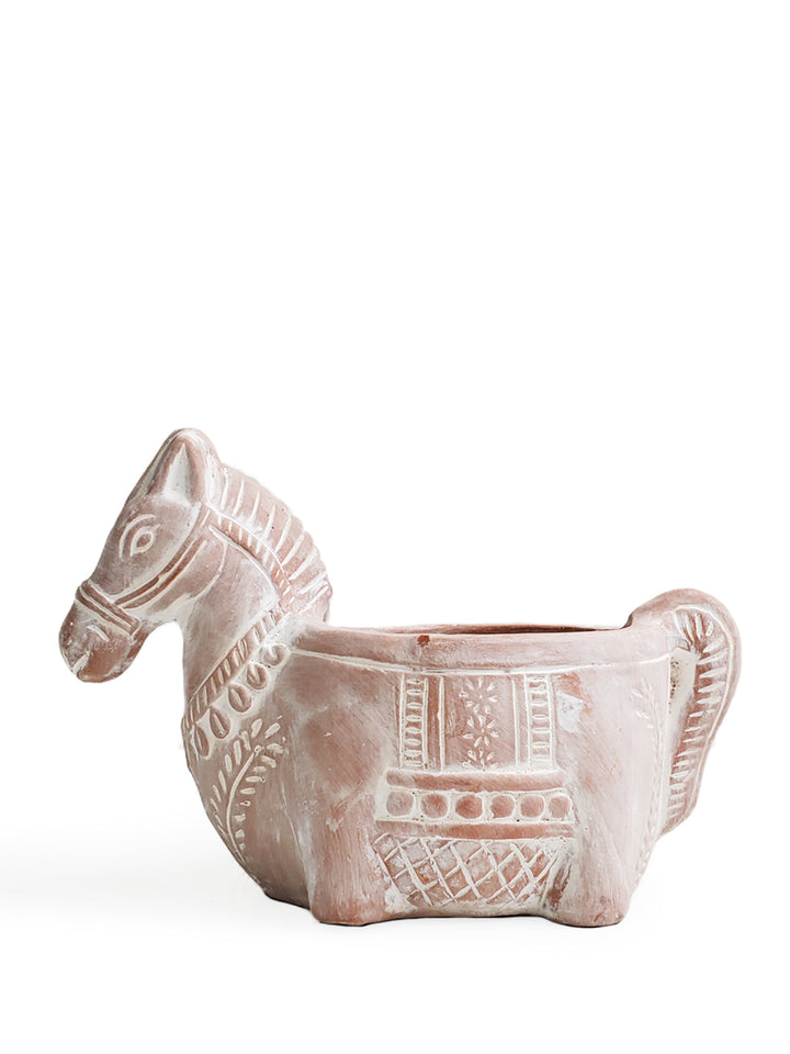 Terracotta horse planter with a hollow interior for plants