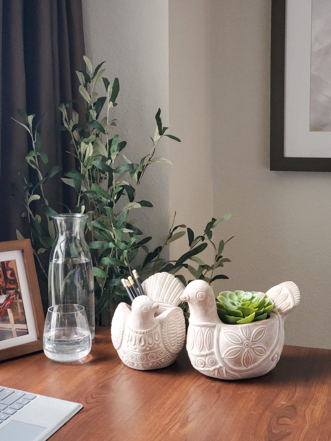 Dove-shaped terracotta planter with a smooth finish