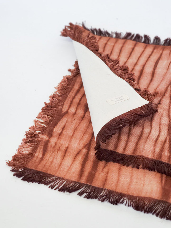 Shibori cotton placemats in rust with hand-bound resist-dye pattern, set of 4