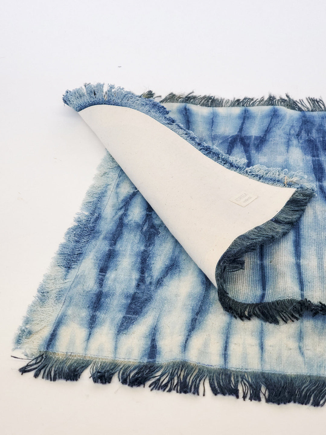 Hand-dyed indigo cotton placemats with shibori resist pattern, set of 4