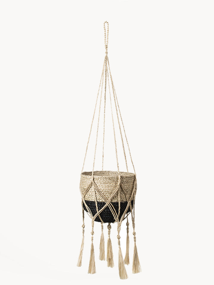 Macrame plant hanger in natural jute with criss-cross knotwork and long tassels