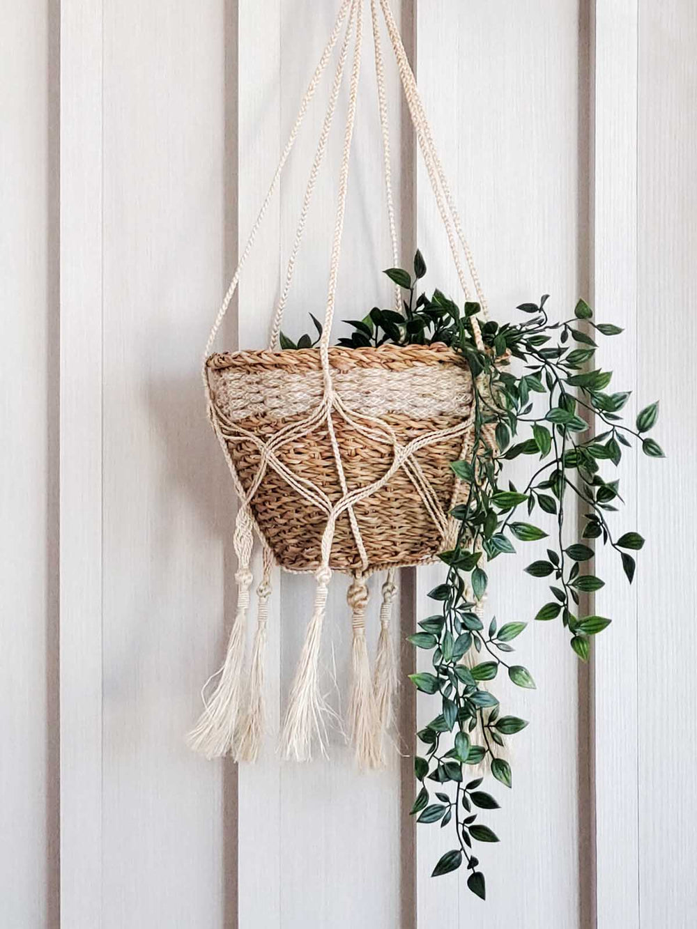 Natural jute macrame plant hanger with multiple long jute tassels